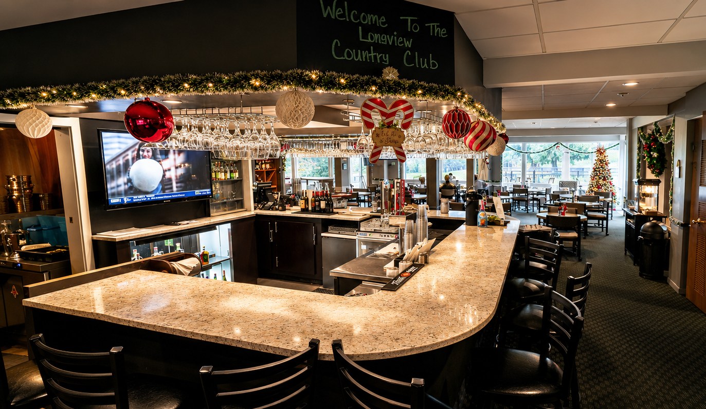 The clubhouse lounge and bar at Longview Country Club with seating and course views